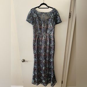 Stunning short sleeved floral embroidered dress by JS Collection. Euro size 2.